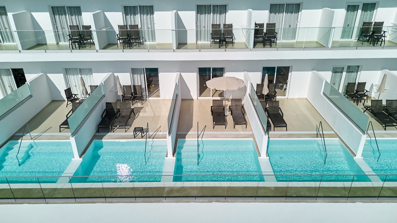 Private swim-up terraces at RIU Palace Aquarelle
