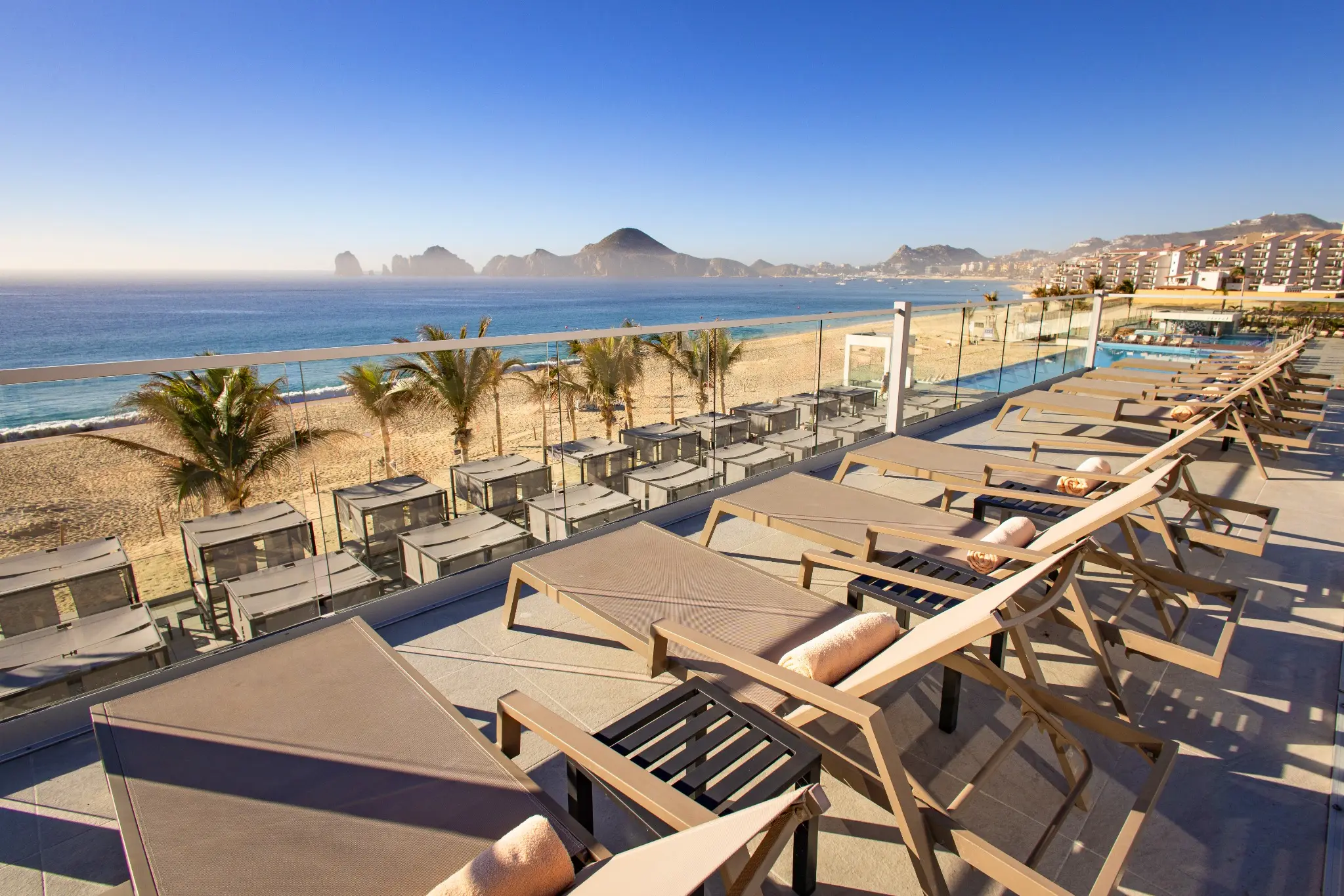 Elite Club oceanfront pool area and sun terrace at RIU Palace Baja California