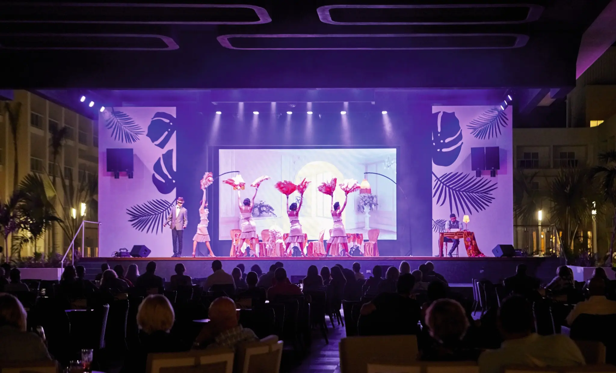 Outdoor evening entertainment stage at RIU Palace Baja California