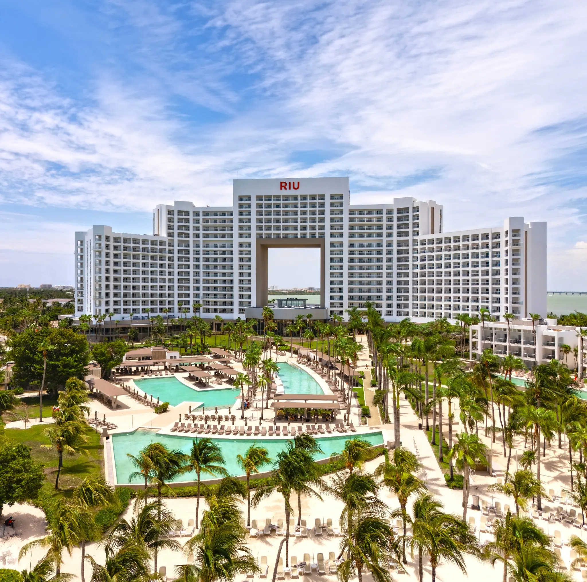 RIU Palace Peninsula towers, tropical gardens, and multiple pools after the 2026 refurbishment