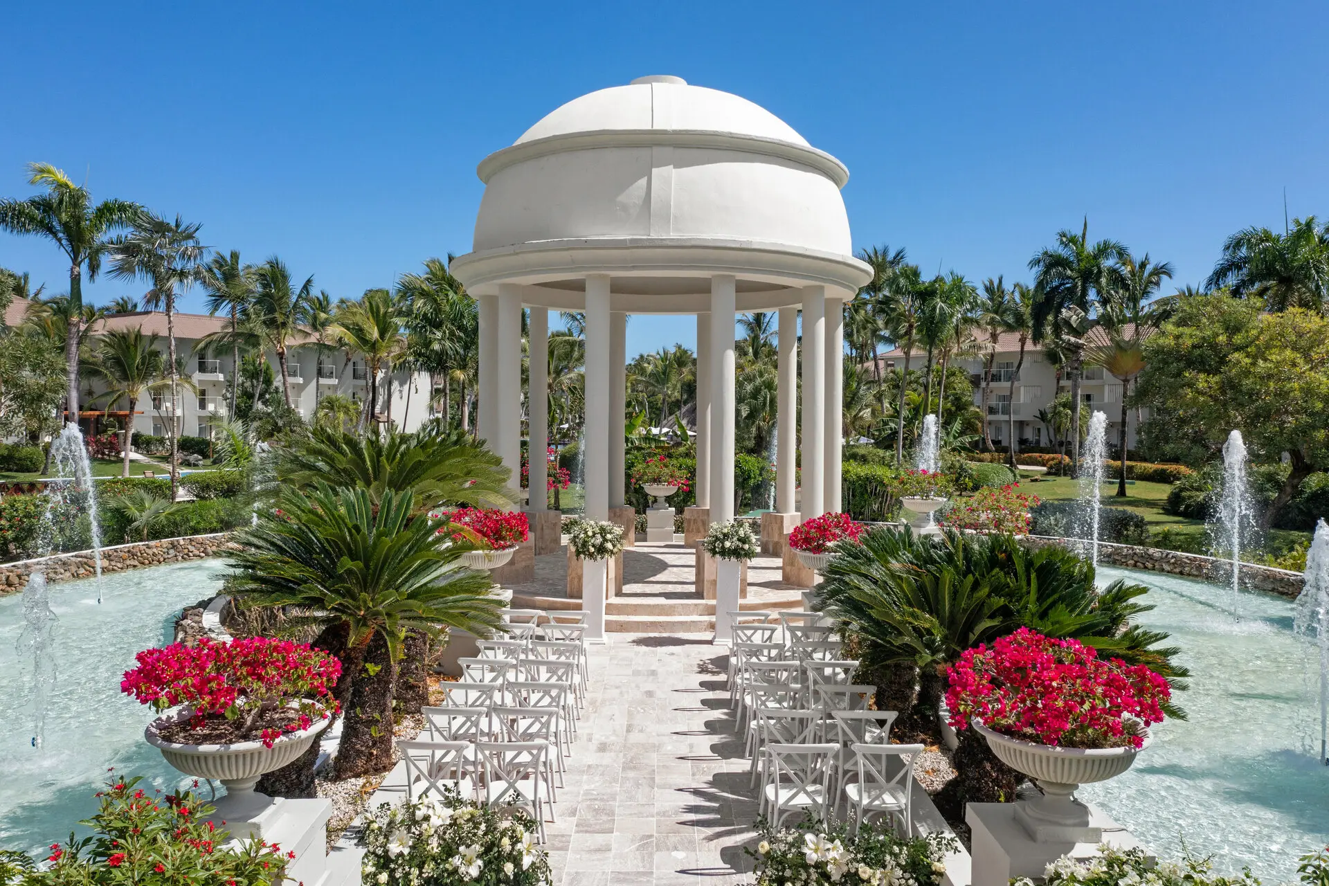 Wyndham Alltra Punta Cana garden wedding gazebo with fountains and tropical flowers